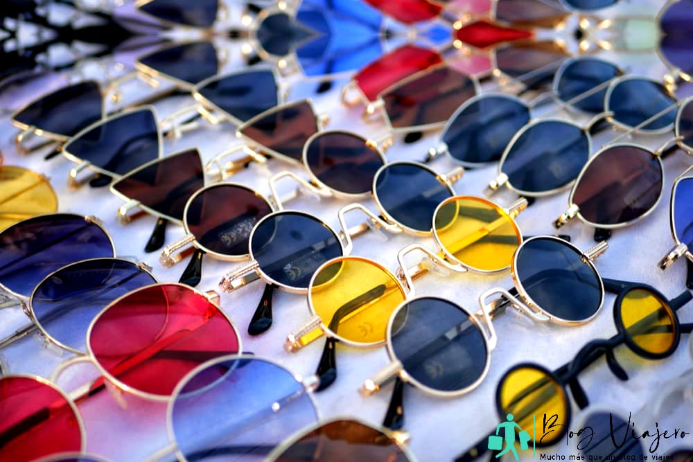 Retro color plastic sunglasses. Cheap retro sunglasses. Vintage sunglasses in the market. Biggest Flea Market in Georgia