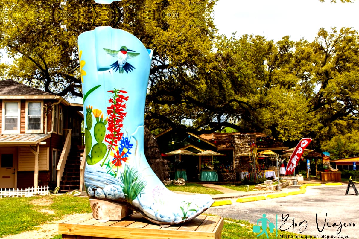 Wimberley, Texas USA - April 6, 2016 Colorful boot art sculpture on display in the small Texas Hill Country town of Wimberley.